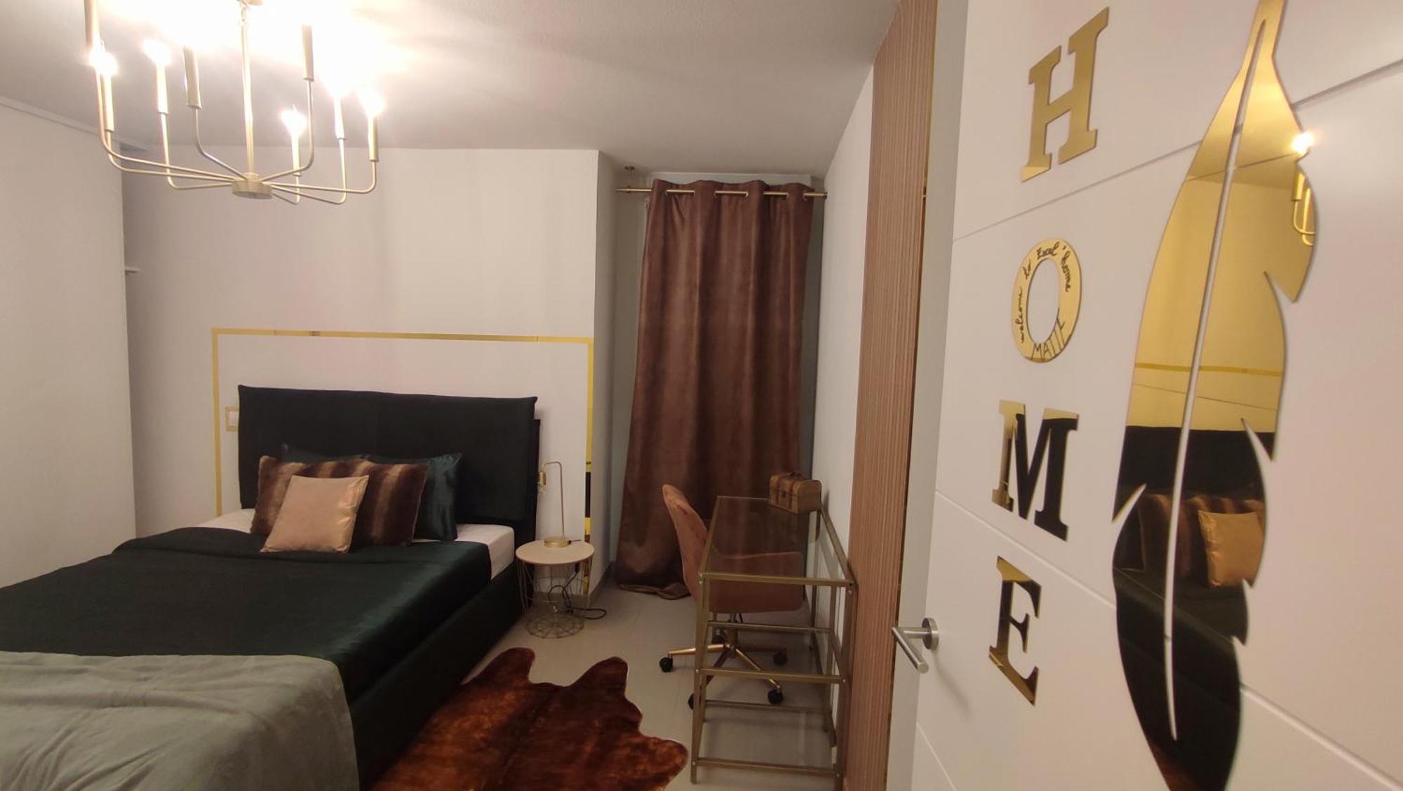 Appartement Escal'home Design Au Pied De L'aeroport, Parkings *